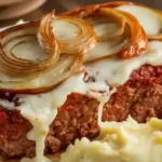 Crockpot French Onion Meatloaf with melted swiss cheese